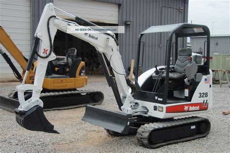 how to drive a bobcat mini excavator|mini excavators working videos.